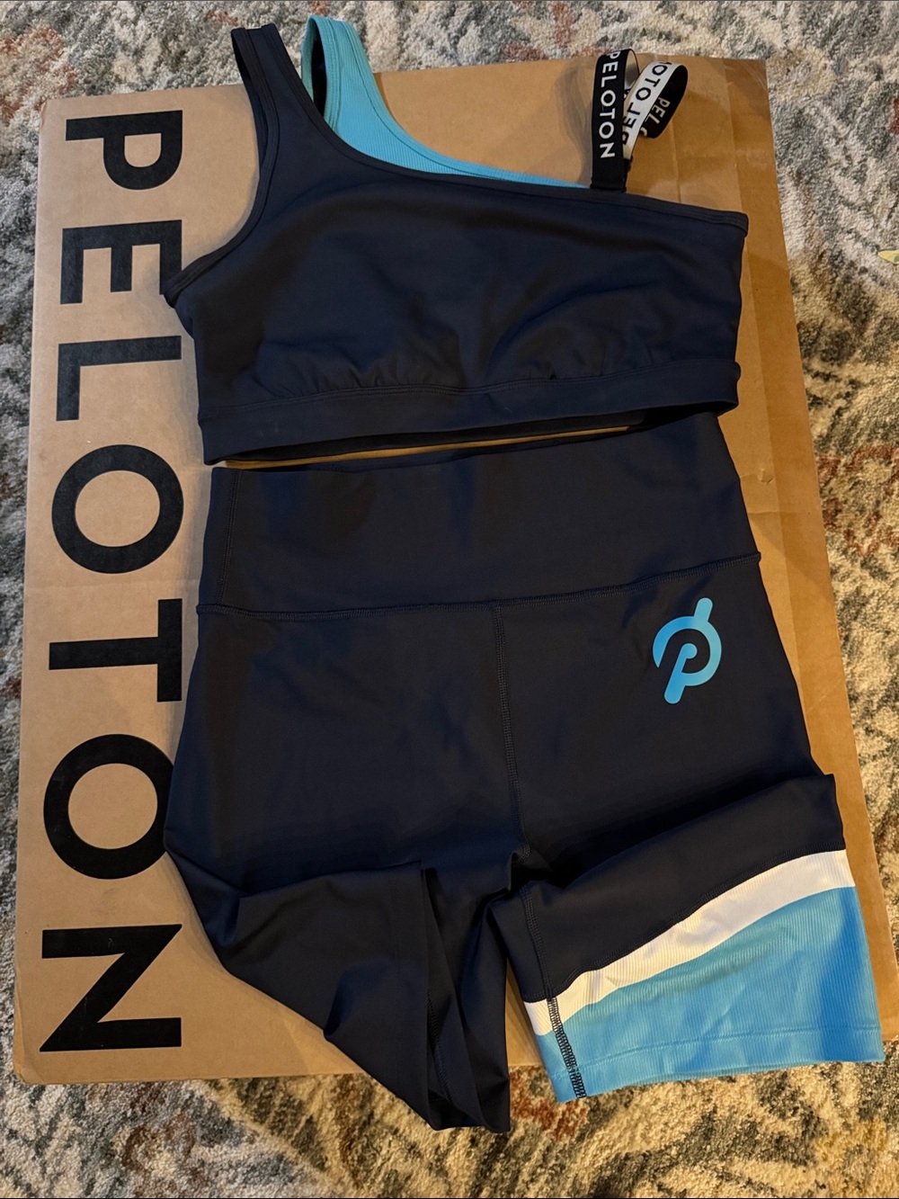 Peloton Navy and Aqua Asymmetric Sports Bra and Bike Shorts Set